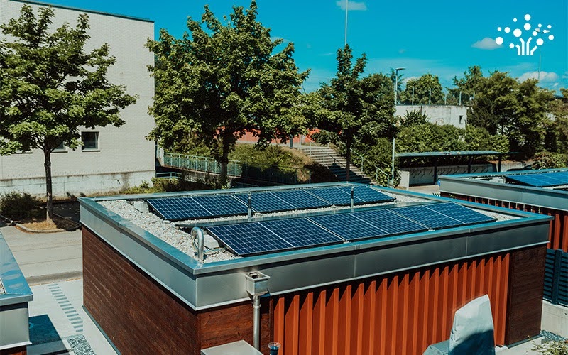 Solar panel system installed on modern building roof